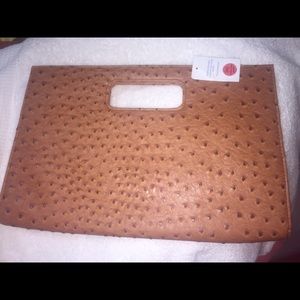 A very nice hand bag!! Brand new